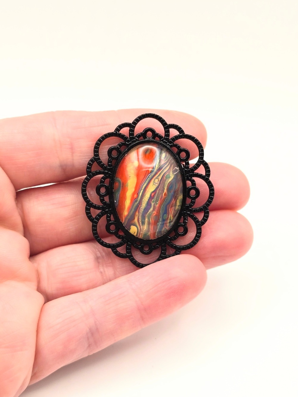 Black Filigree Brooch with Multicolor Oval Cabochon